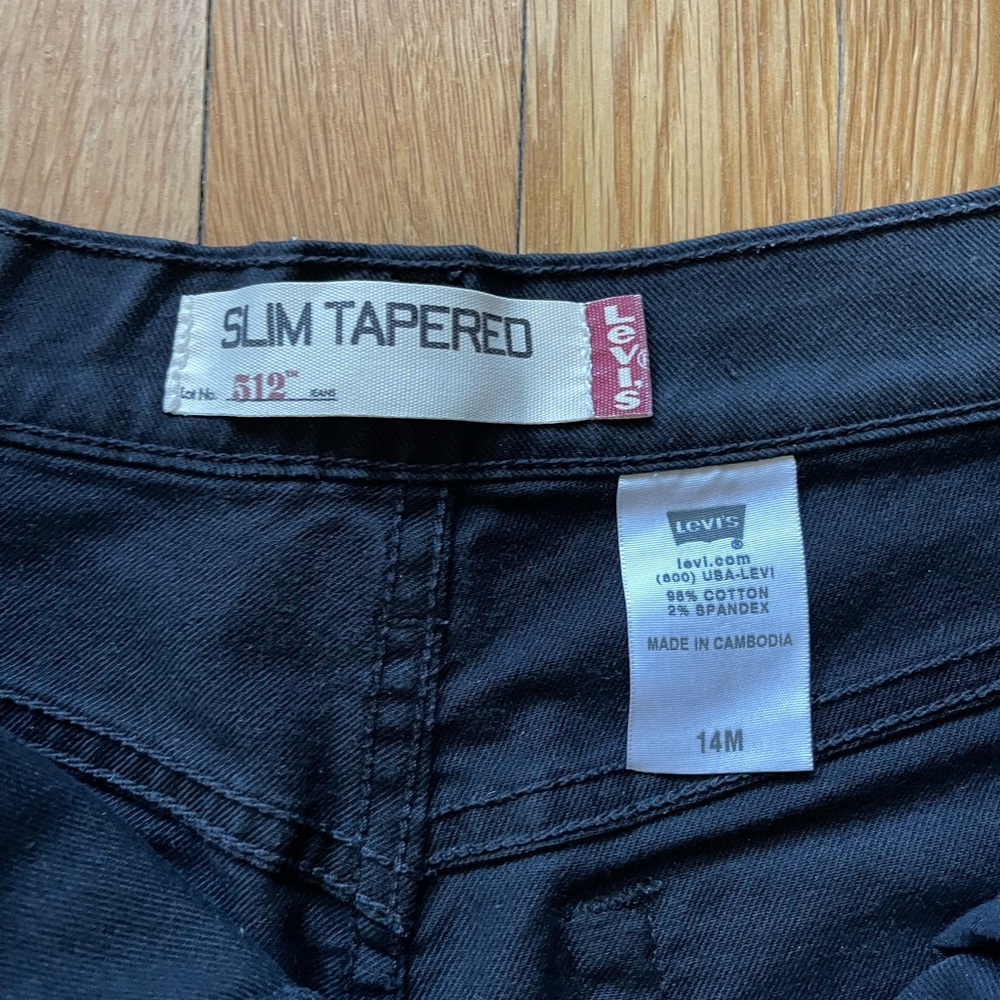 Levi’s slim tapered black jeans